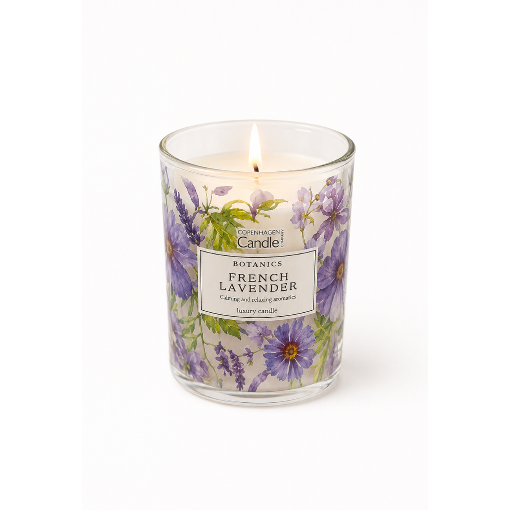 Candle in a glass jar with floral design and 'French Lavender' label on a white background